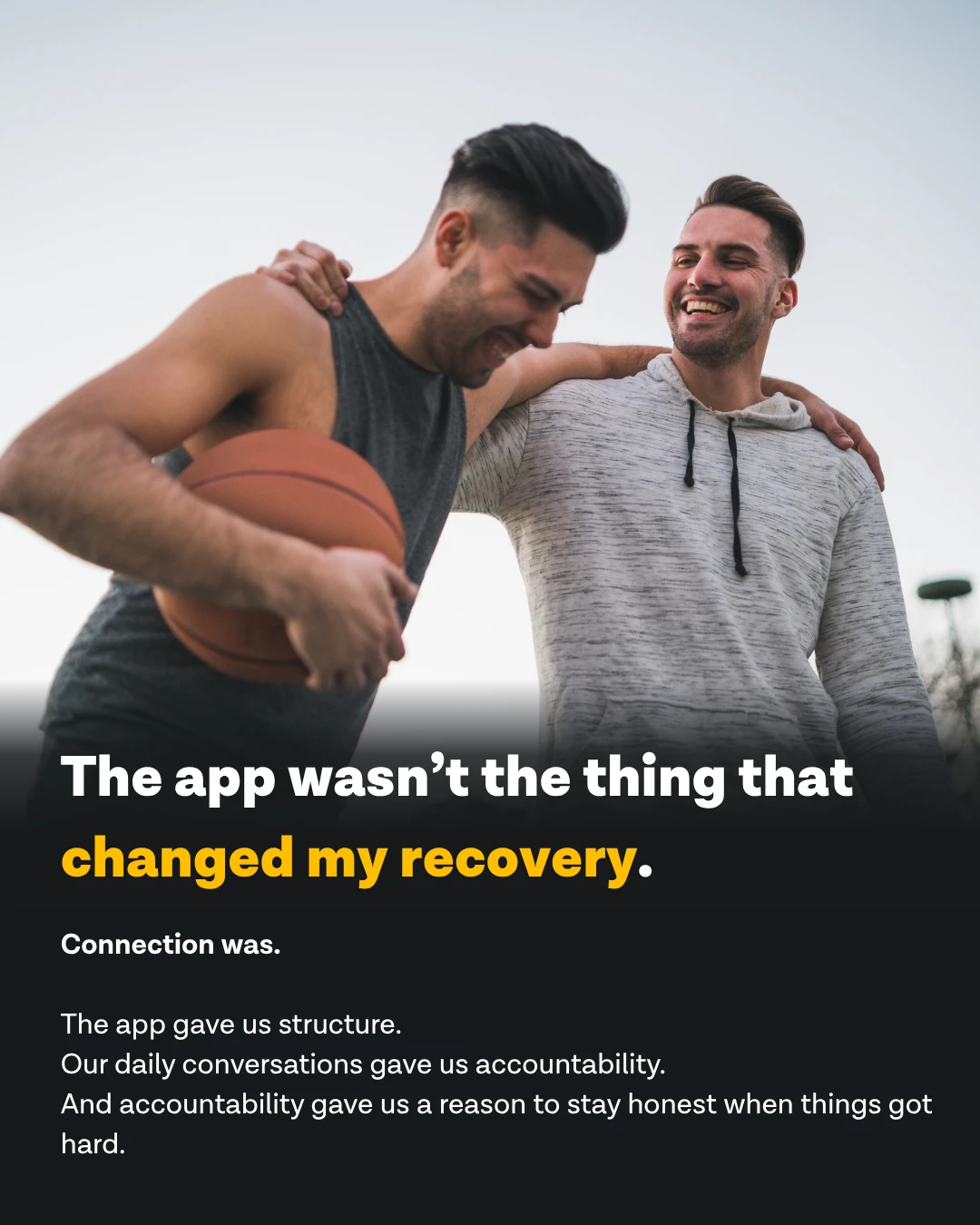 Two brothers laughing together while playing basketball - Mac Dohm on how connection, not the app itself, is what changed his recovery - Ever Accountable