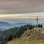 cross on a mountain at sunset From Porn Addiction to Personal Growth